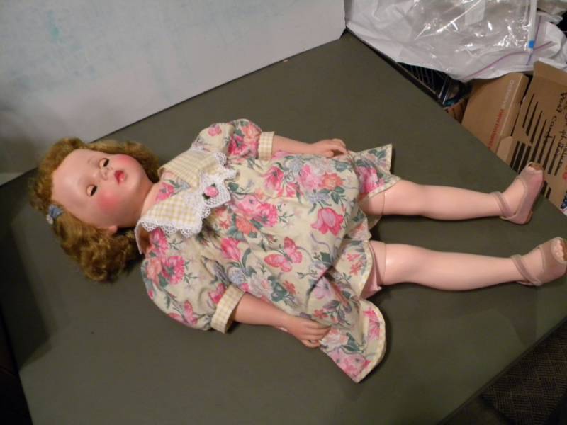 lot 64 image: Tall Collectible Doll