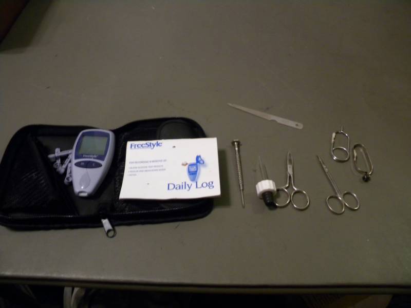 lot 76 image: Free Style Blood Tester and other Medical Tools