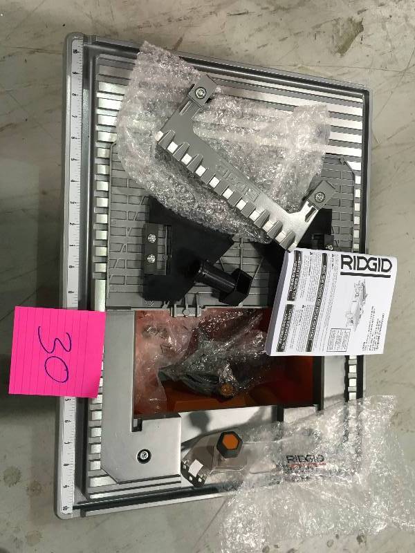 lot 30 image: Ridgid 120-Volt 7 in. Table Top Wet Tile Saw