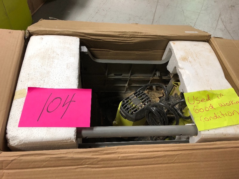 lot 104 image: Ryobi 10 in. Table Saw with Folding Stand used in working condition