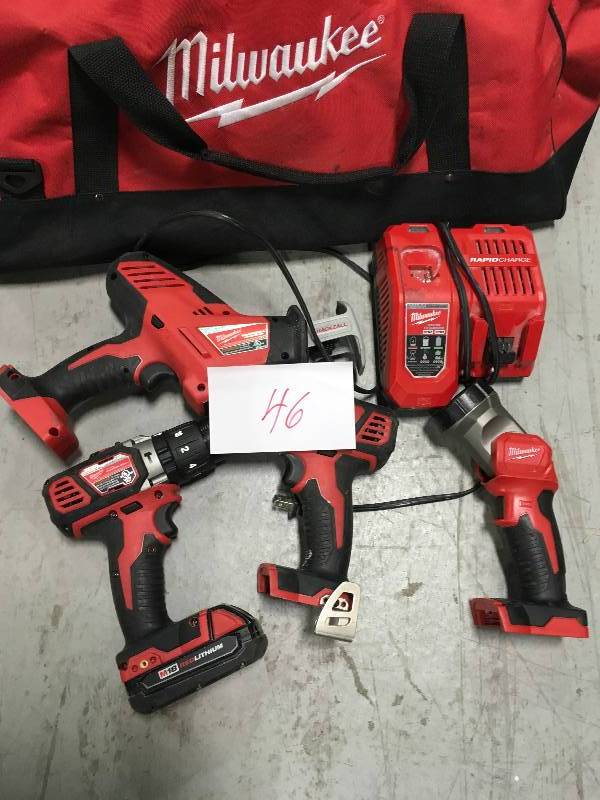 Milwaukee M18 18-Volt Lithium-Ion Cordless Combo Tool  (4-Tool) 1 battery Used in good working cond.