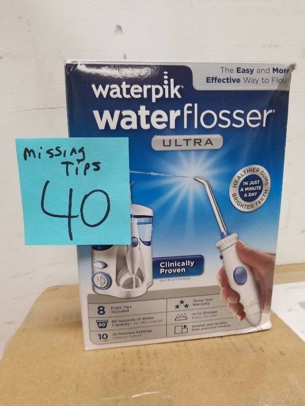 lot 40 image: Waterpik Ultra Water Flosser Missing Tips