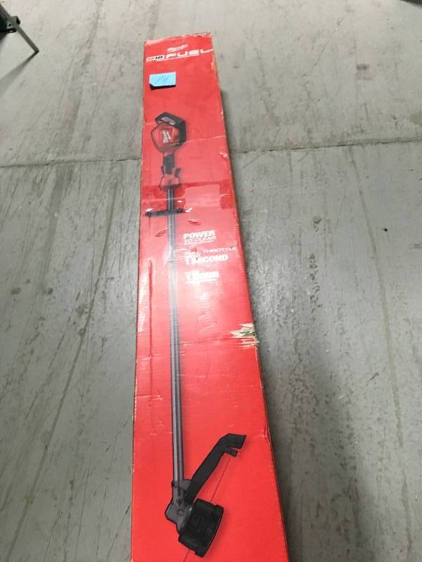 lot 74 image: Milwaukee 2725-21 M18 FUEL String Trimmer Kit  in good working cond.