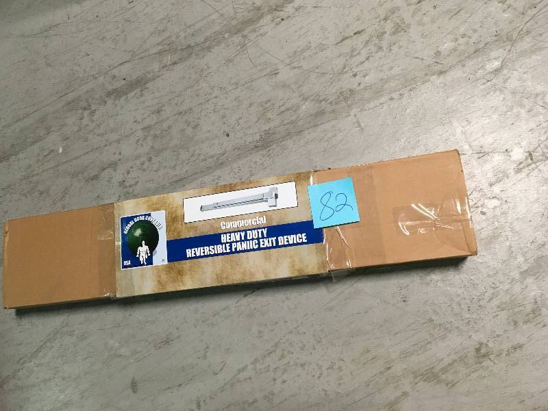 lot 82 image: Global Door Controls 32 In. Aluminum Touch Bar Exit Device TH1100EDTBARAL not used