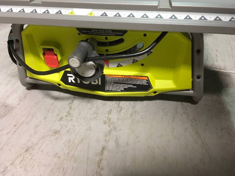 lot 88 image: RYOBI 10 in. 15 Amp Table Saw in good working conditions