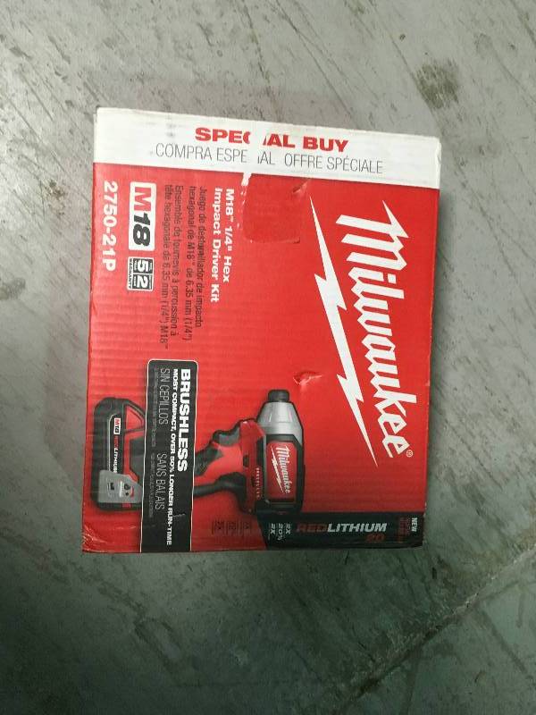 lot 100 image: Milwaukee 2750-21P M18 18-Volt Compact Brushless 14 Hex Impact Driver Kit not used