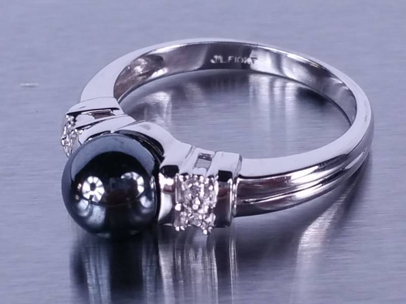 lot 34 image: Black Pearl and Diamond Ring in White Gold