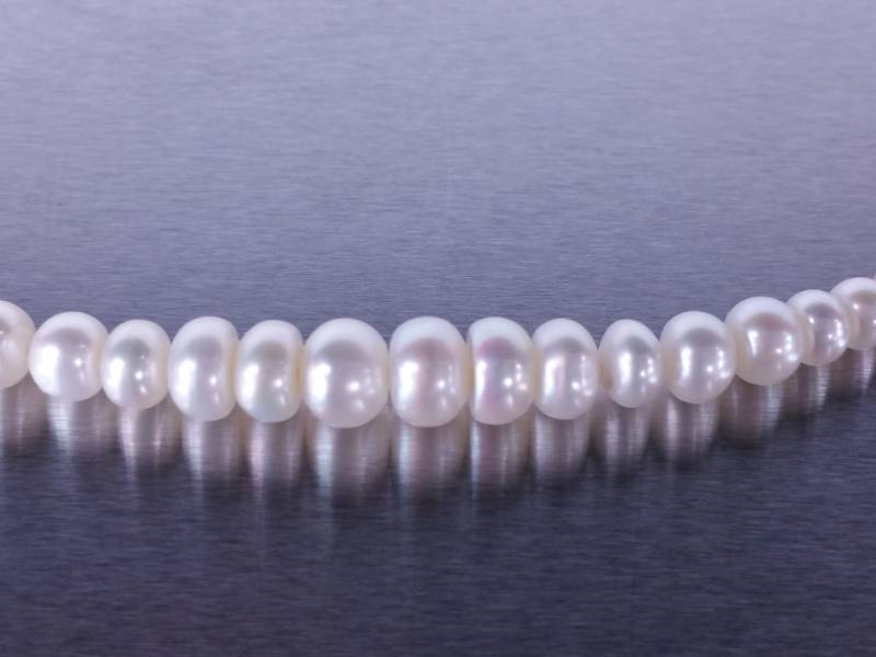 lot 38 image: High End Natural Matching Graduating Pearl Necklace - 14k