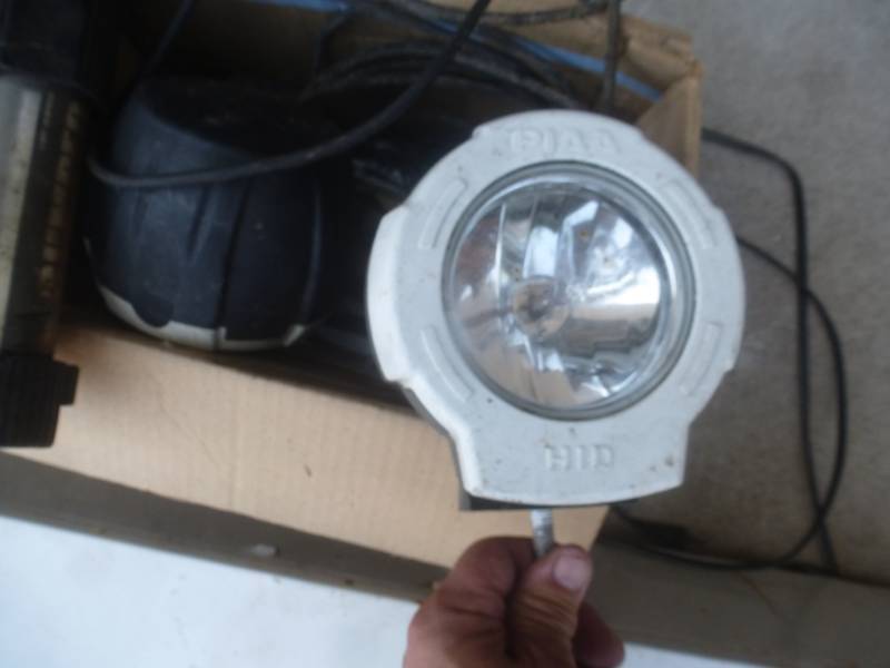 lot 28 image: Electric Base Board Heater & Halogen Lights