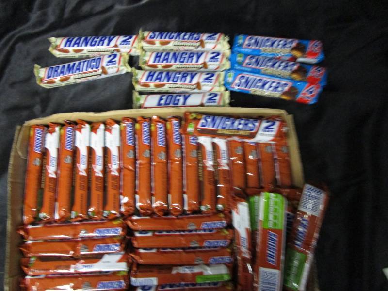 lot 76 image: 42 Bars, combination of Snickers Crispers and Snickers Hazelnut and Snickers Almond ( King Size- 2 Bars in each)