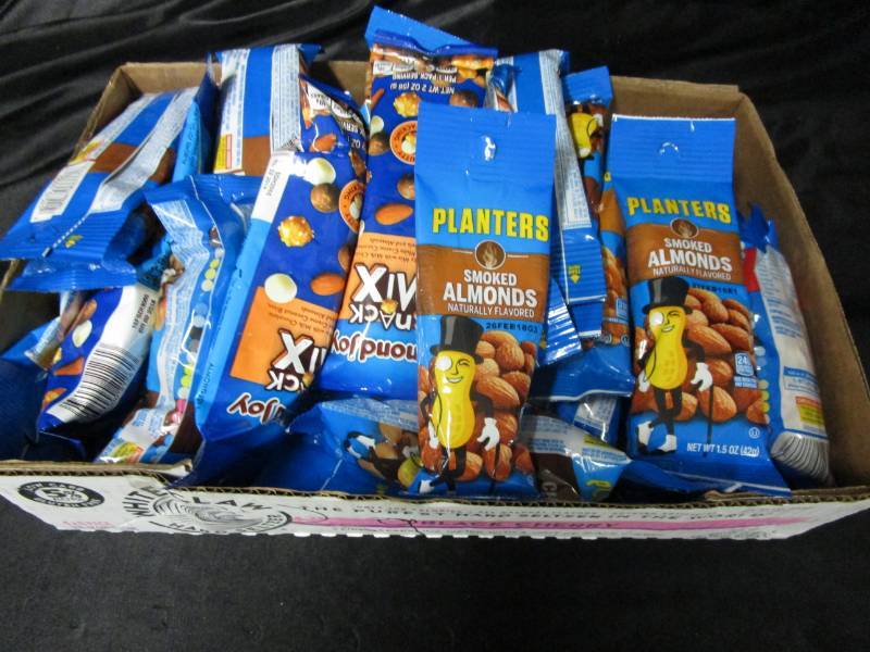 lot 144 image: 40 Various Flavor and Size Planter Nuts and Snacks