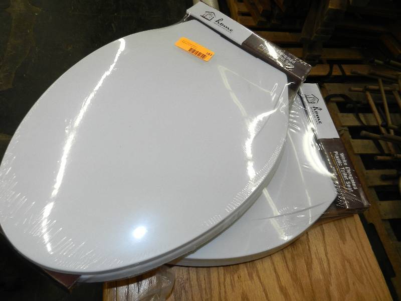lot 187 image: TWO PLASTIC ELONGATED TOILET SEATS, NEW IN PKG