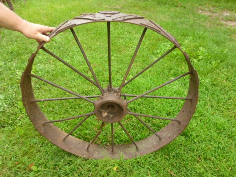 lot 108 image: Antique Steel Wheel