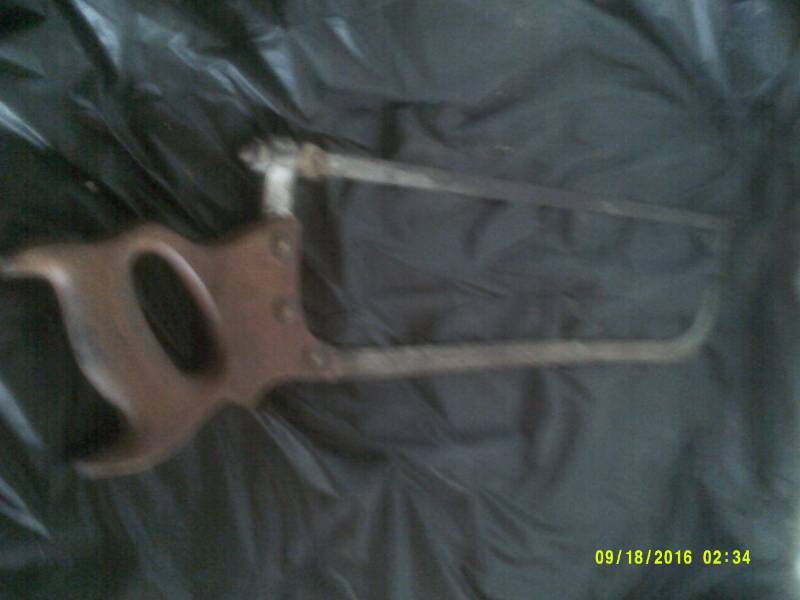 lot 43 image: ANTIQUE MEAT SAW