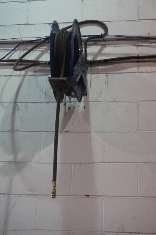 lot 32 image: Cox Reels Brand 50 Retractable Wall Mount Pneumatic Hose Reel