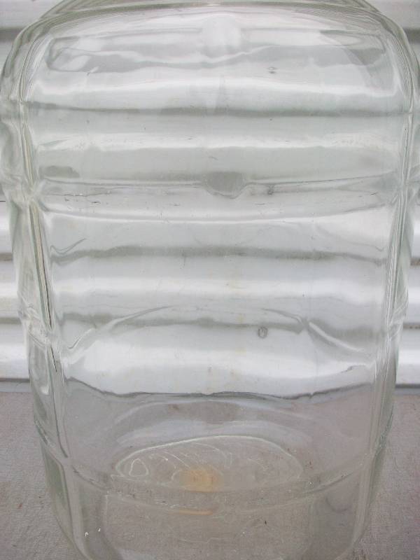lot 12 image: 5 Gallon Glass Bottle