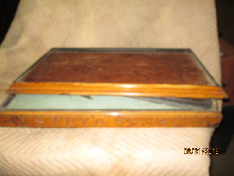lot 142 image: JS Fry & Son Display Case parts...
