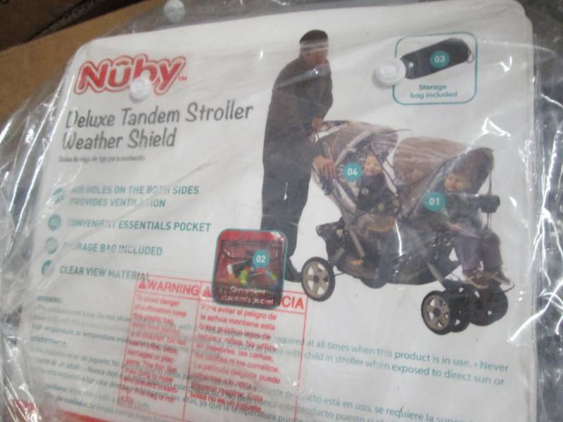lot 7 image: Nuby Deluxe Tandem Weather Shield o...