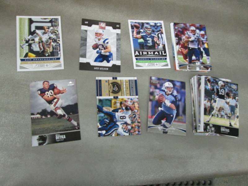lot 107 image: 50 Football Cards...