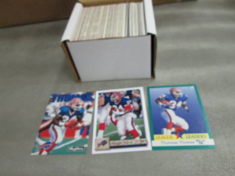 lot 129 image: 200 Thurman Thomas Cards...