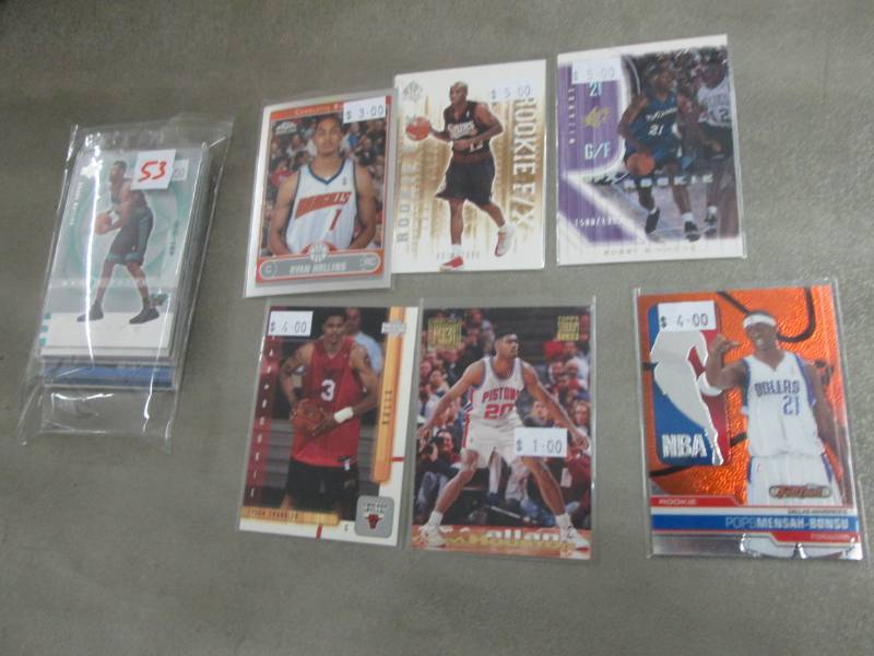 lot 153 image: 20 Basketball Rookie Cards...