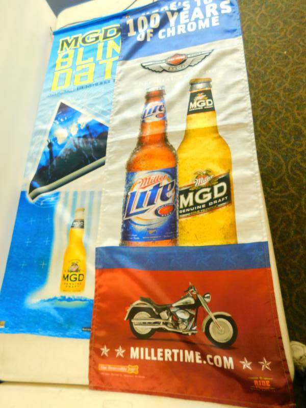 lot 60 image: MGD  BLIND DATE--Live In The Bermuda Triangle & Miller Lite-MGD Nylon Banners