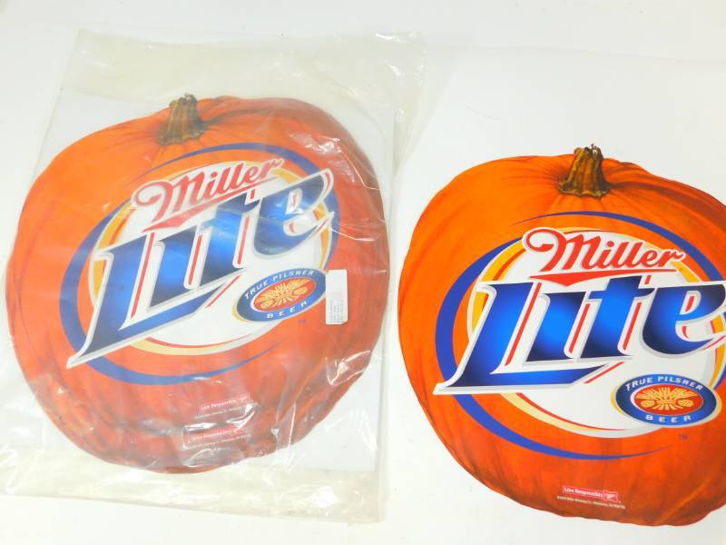 lot 72 image: Thirty Miller Lite Halloween Pumpkin Decor