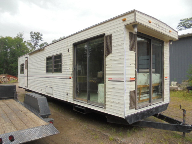 lot 8 image: Park Model Trailer