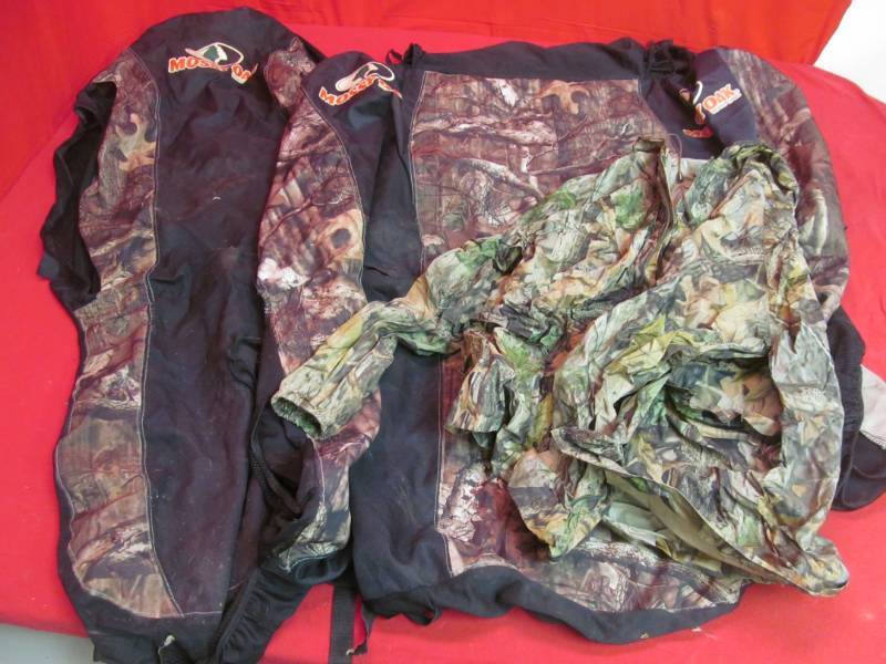 lot 29 image: Mossy Oak auto mobile seat covers, rain coat