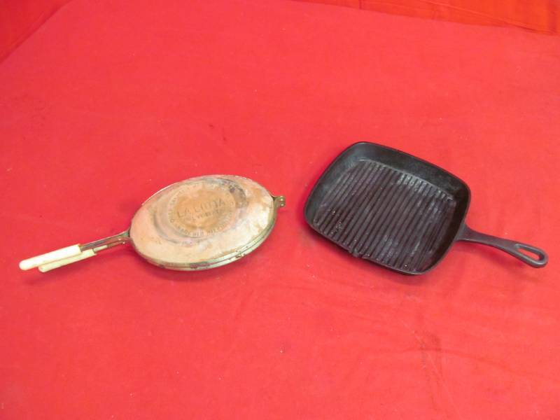 lot 68 image: cast iron skillet, clay camp oven pan