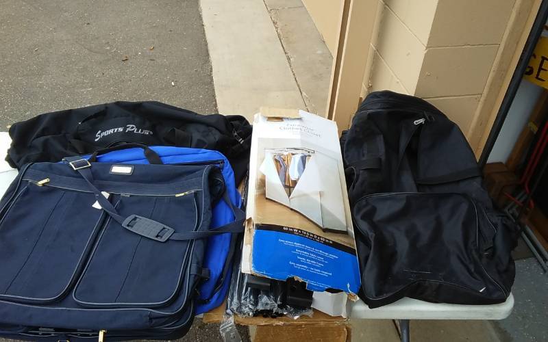 lot 19 image: Garment Rack & Duffel Bags