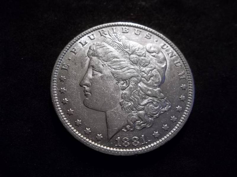 lot 6 image: 1881 O Morgan Silver Dollar