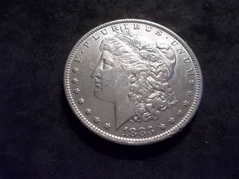 lot 11 image: 1883 O Morgan Silver Dollar
