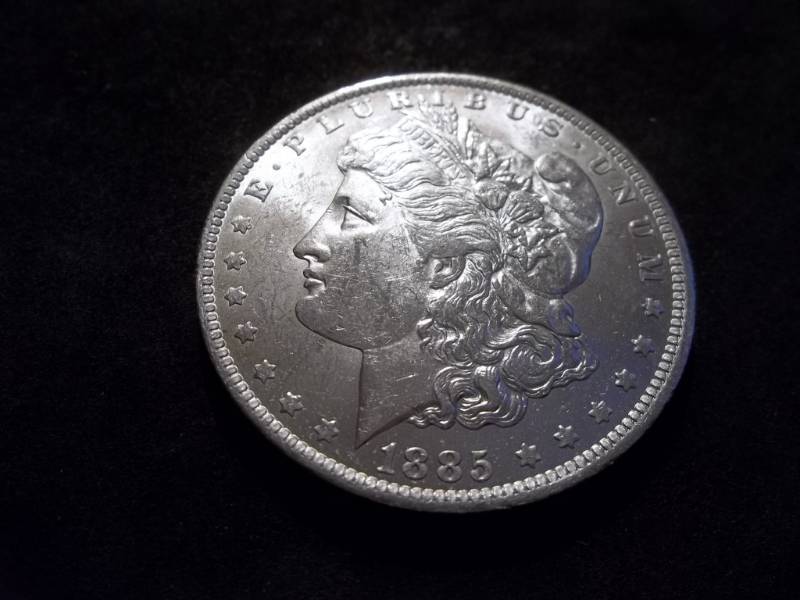 lot 14 image: 1885 O Morgan Silver Dollar