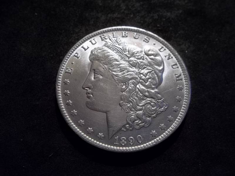 lot 19 image: 1890 O  Morgan Silver Dollar