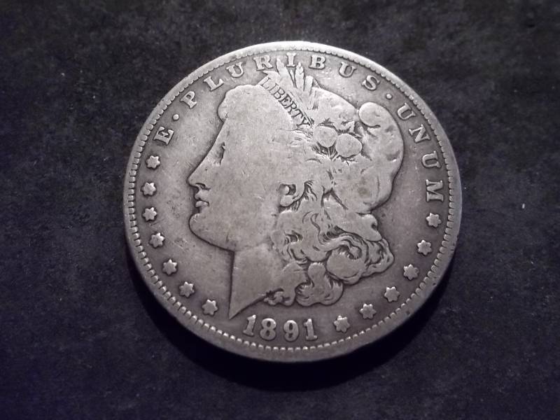 lot 21 image: 1891 S Morgan Silver Dollar