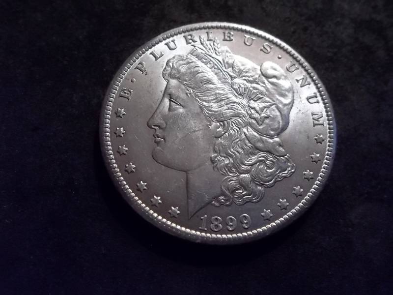 lot 25 image: 1899 O Morgan Silver Dollar