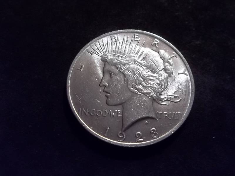 lot 32 image: 1923 Peace Silver Dollar