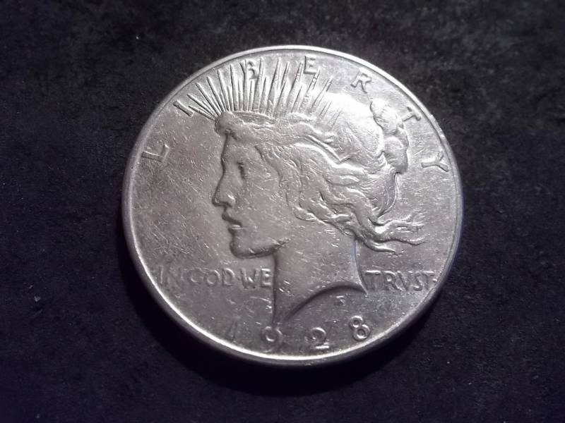 lot 35 image: 1928 S Silver Peace Dollar