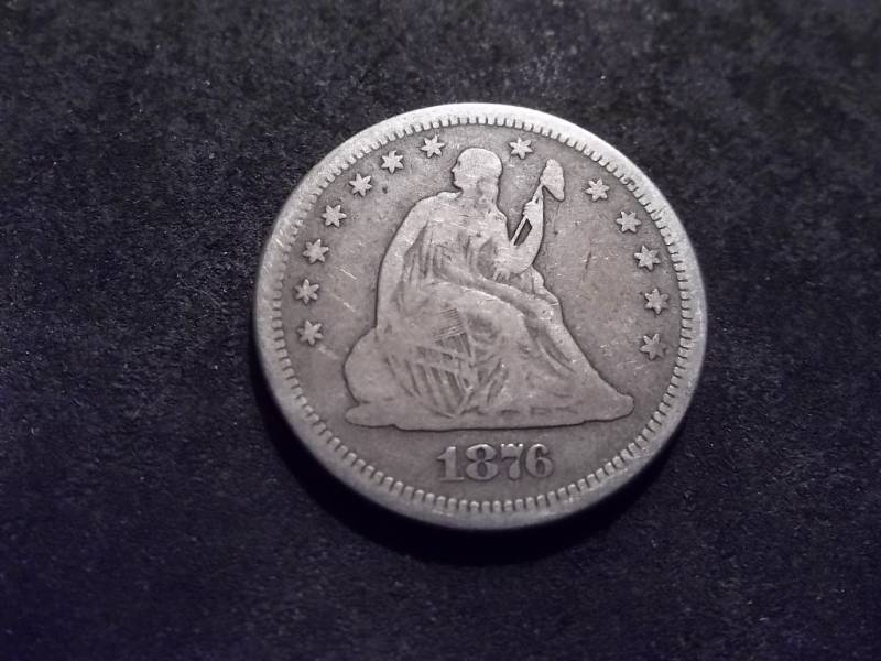 lot 104 image: 1876 S Seated Liberty Quarter