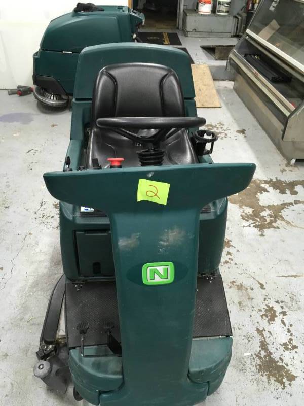 lot 2 image: Nobles Speed Scrub Rider 32 Riding Floor Scrubber with SQUEEGEE item was used in the last 5 month. Item have tear and wear from use. Please note winning bidder will need to bring help to remove item.