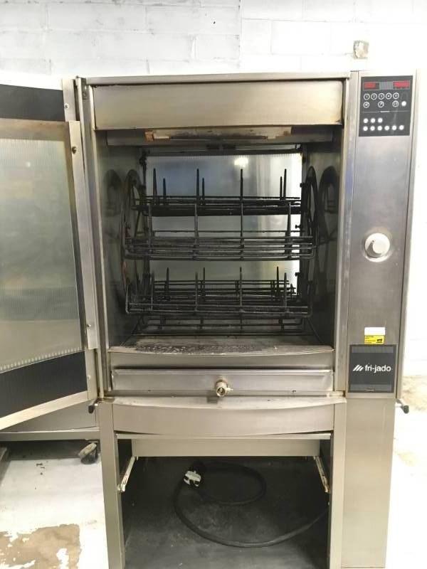 lot 8 image: Fri-Jado STG7-P Stainless steel Single Electric Rotisserie Chicken Meat Baking Pass-Thru Oven used with in the last 5 month no racks minor dents due to tear and wear. Please not winning bidder will need to bring help to remove equipment.