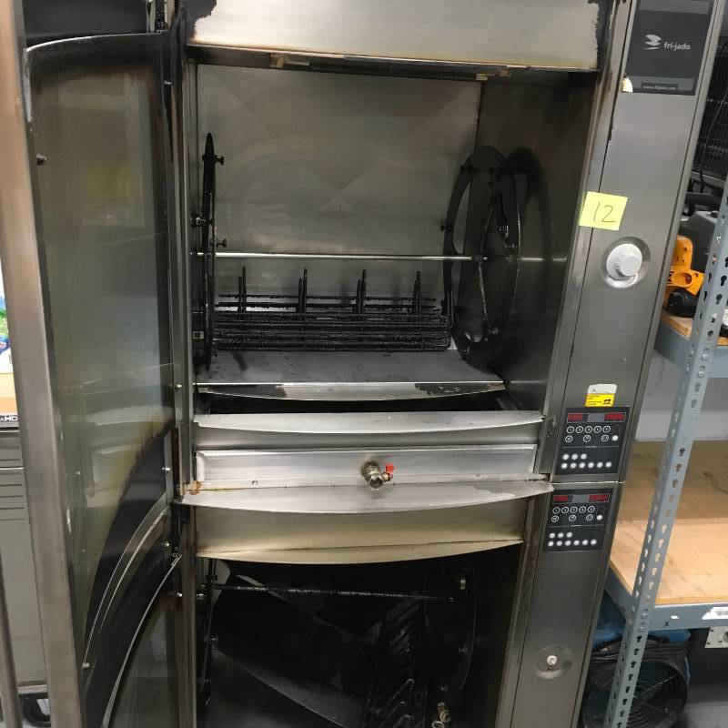 lot 12 image: Fri-Jado STG7  Electric Double Stack Commercial Chicken Rotisserie used with in the last 5 month inside racks are dirty some dents. Please not winning bidder will need to bring help to remove equipment. Some tear and wear from use or missing parts.
