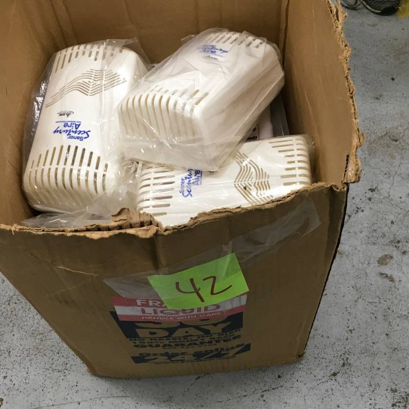 lot 42 image: A box with RMC Sanor Scentury Aire Dispensers.