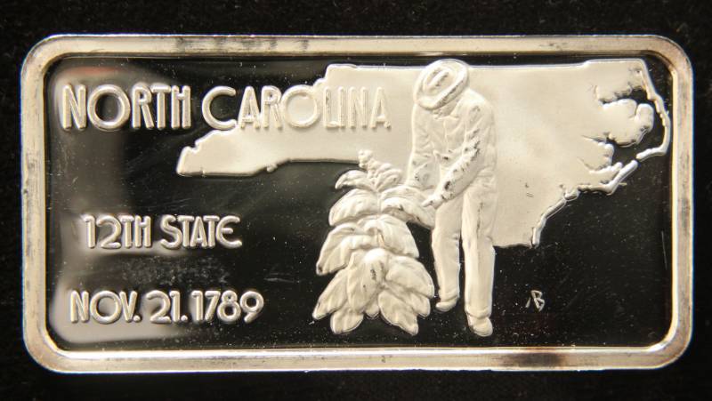 lot 07 image: 1 TROY OZ. .999 FINE SILVER BAR 50 STATES SERIES NORTH CAROLINA