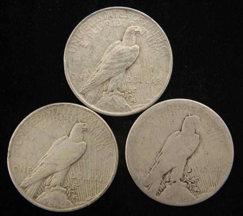 lot 16 image: (3) US PEACE SILVER DOLLARS AS PICTURED