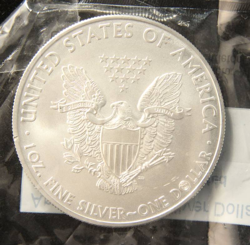 lot 54 image: 2008 AMERICAN SILVER EAGLE 1 TROY OZ. .999 FINE SILVER SEALED BY LITTLETON