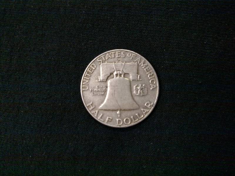 lot 40 image: 1957 D Franklin Silver Half Dollar...
