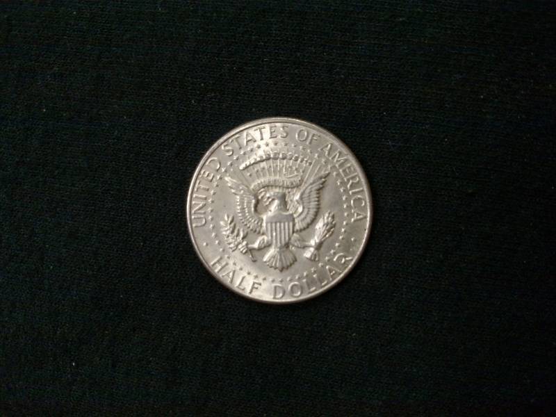 lot 42 image: 1964 Kennedy Silver Half Dollar...