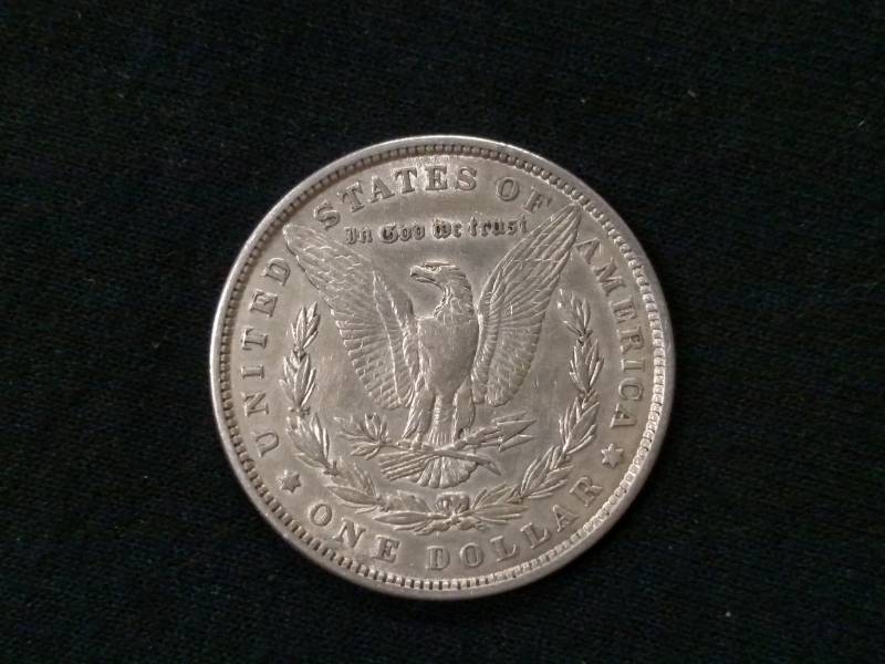 lot 11 image: 1880 Morgan Silver Dollar...